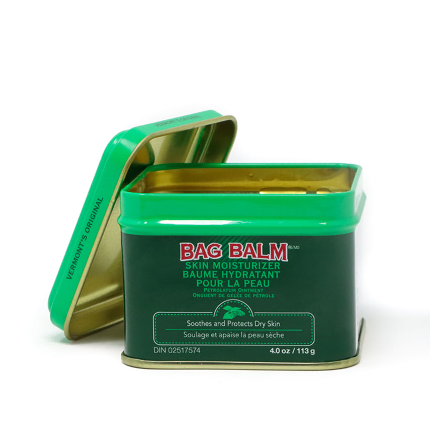 Bag Balm Skin Moisturizer 8 oz tin. The tin features a green design with the Bag Balm logo on the front. The moisturizer is known for its soothing and hydrating properties, suitable for dry or chapped skin. The tin is set against a white background.